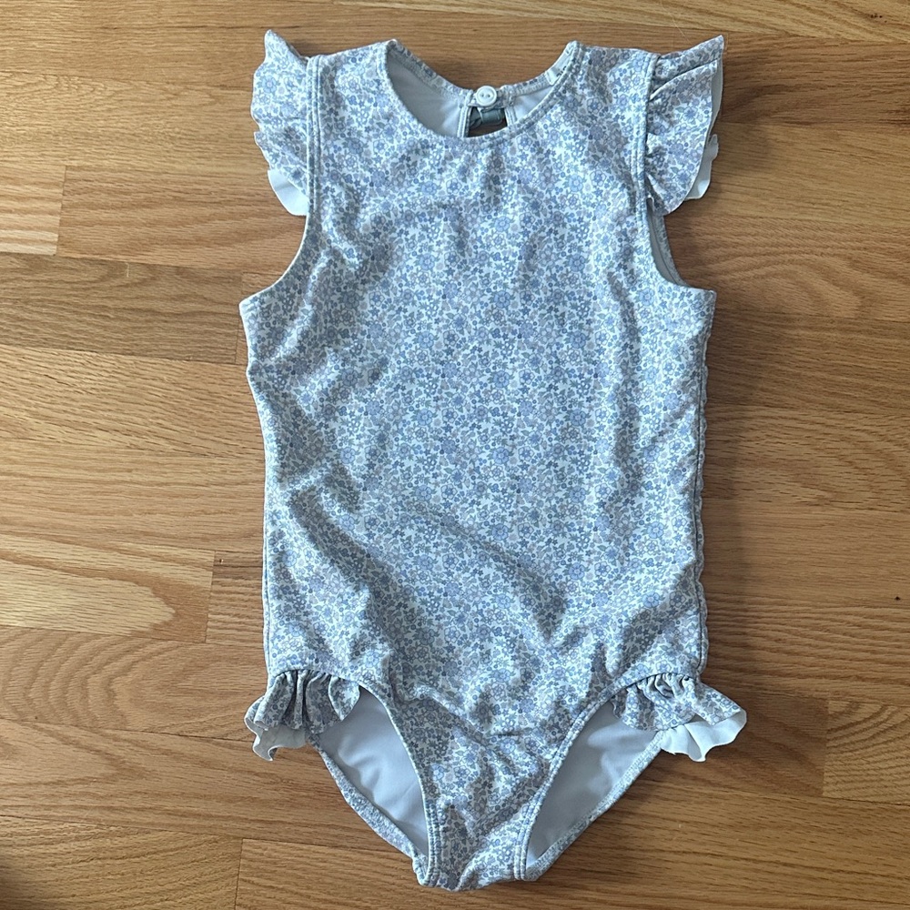 Minnow one-piece ruffle cap sleeve swimsuit
